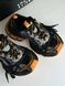 Black sneakers with orange inserts, In stock, 37