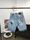 Denim shorts with crosses, M