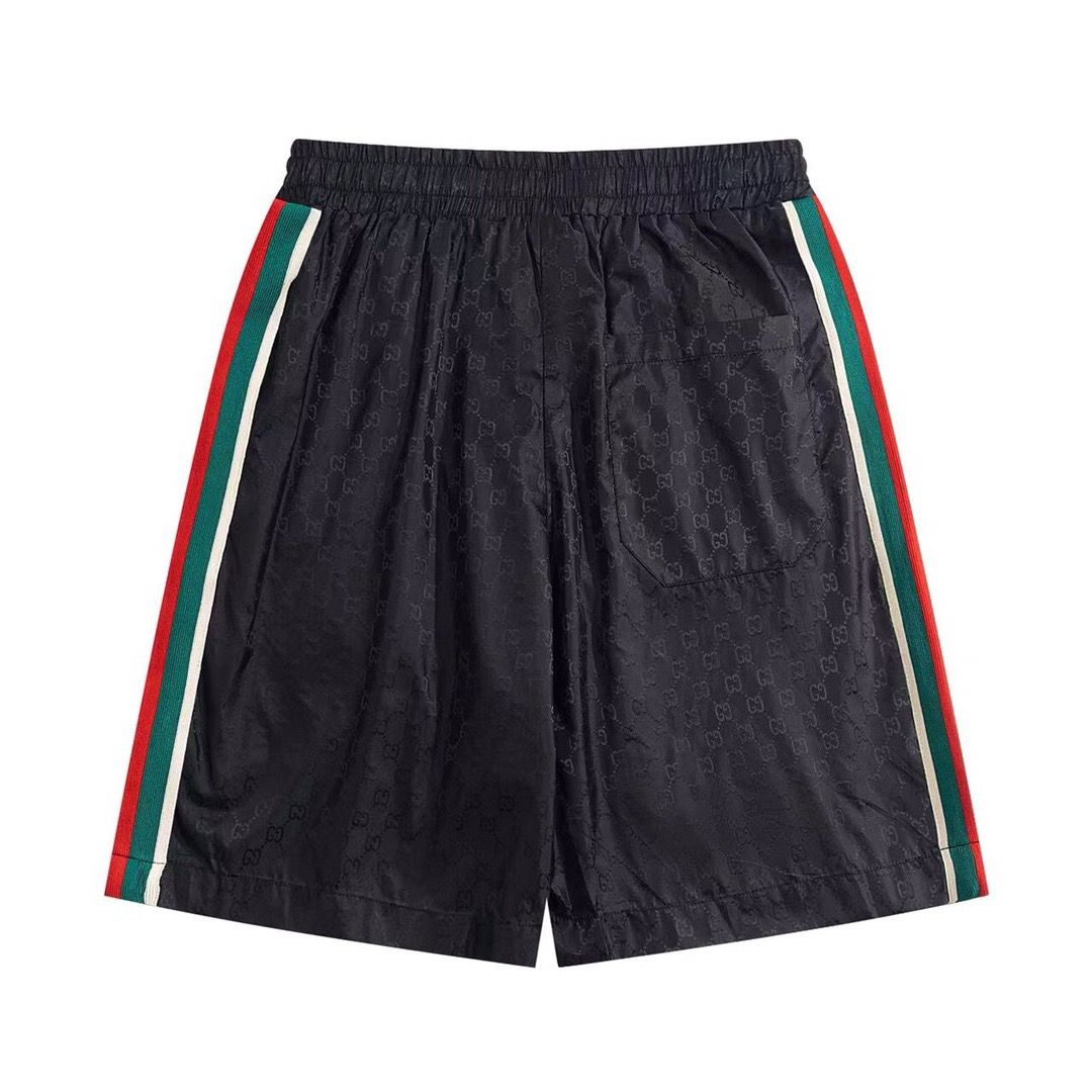 Black shorts with colored stripes GG, L