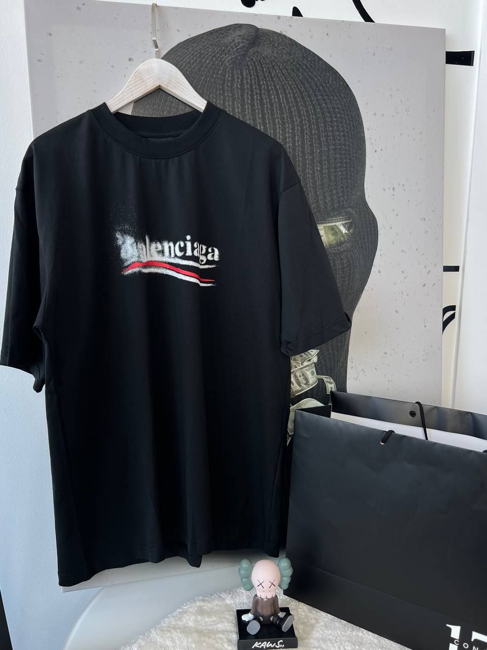 Black T-shirt with blurred logo, S