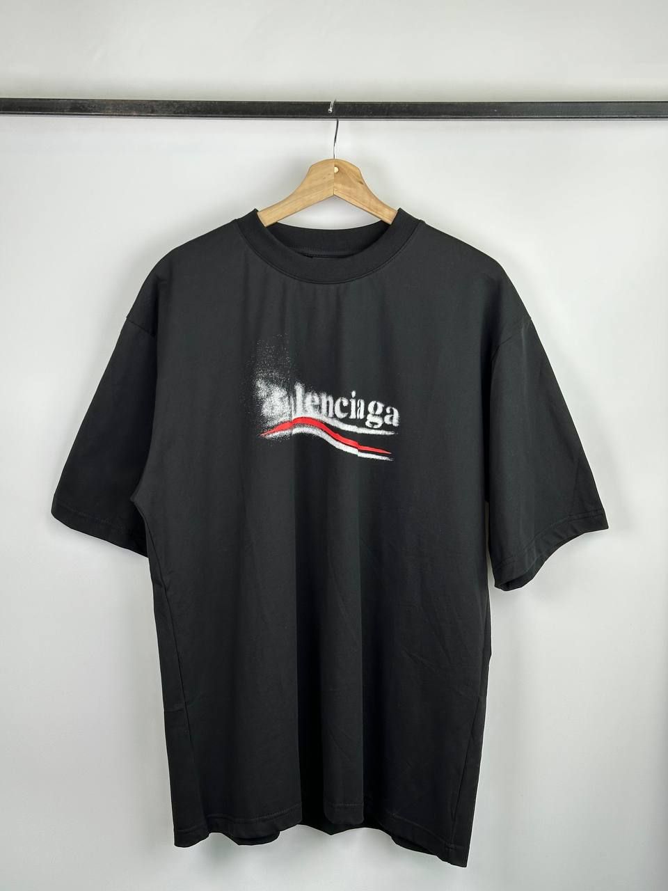 Black T-shirt with blurred logo, S