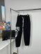 Black pants with print on the side, S