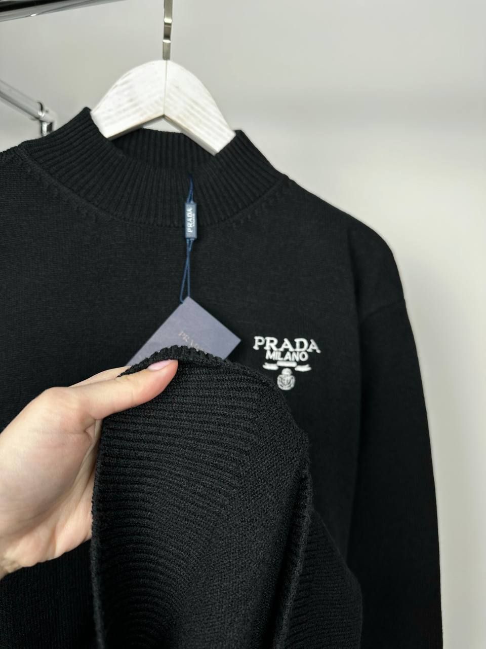 Black sweater with logo on the side, M