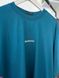 Turquoise T-shirt with white lettering, L