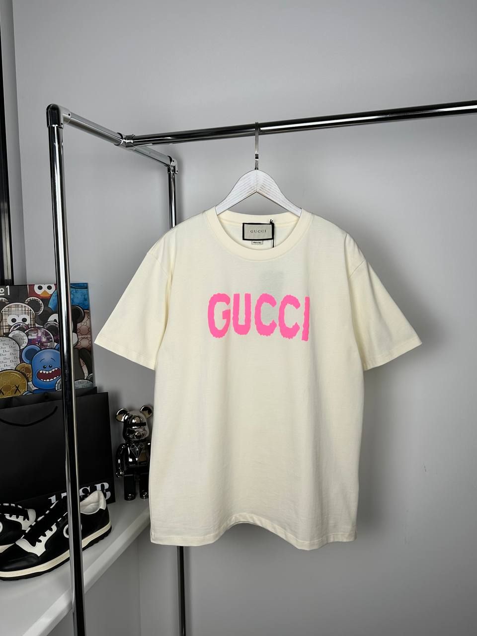 Beige T-shirt with pink lettering, M