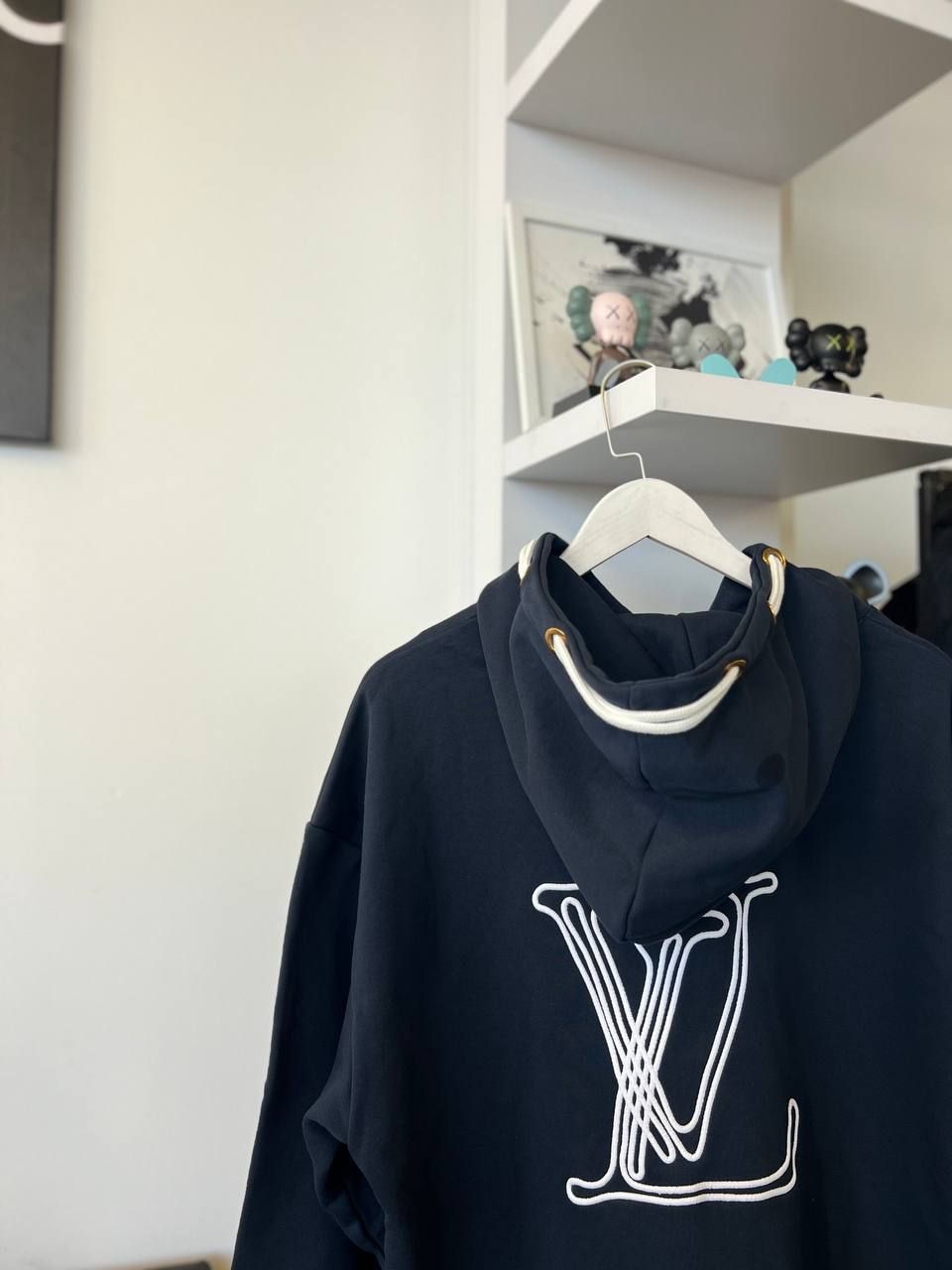 Dark blue hoodie with logo on the back, M