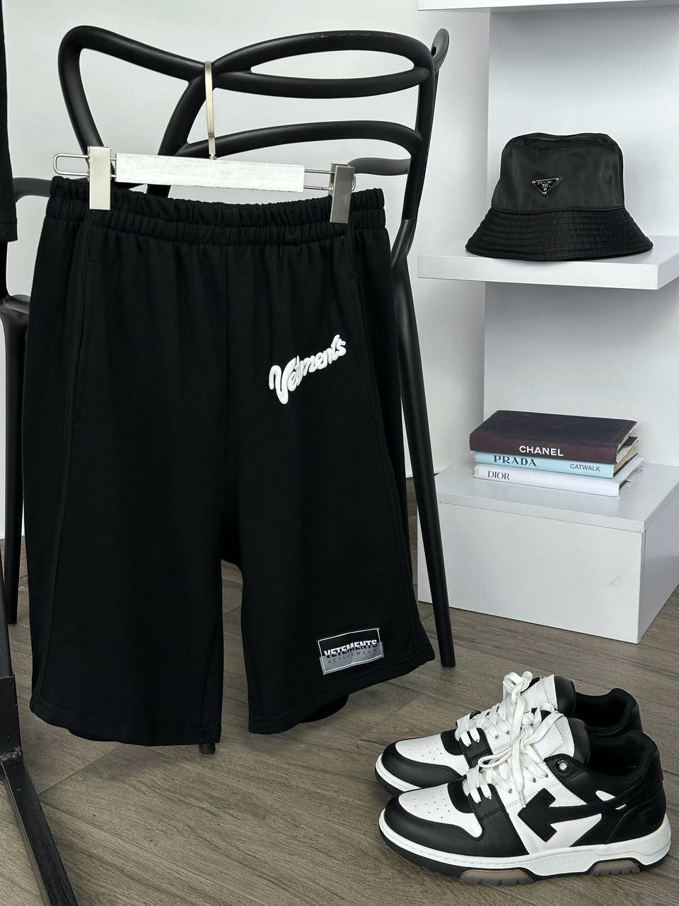 Black shorts with white lettering, L