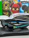 Black frame glasses with chameleon inserts, 1