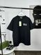 Black T-shirt with white lettering on the side, S