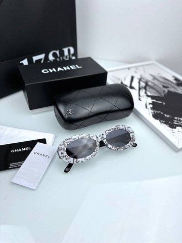 CHANEL glasses are white with inscriptions, 1