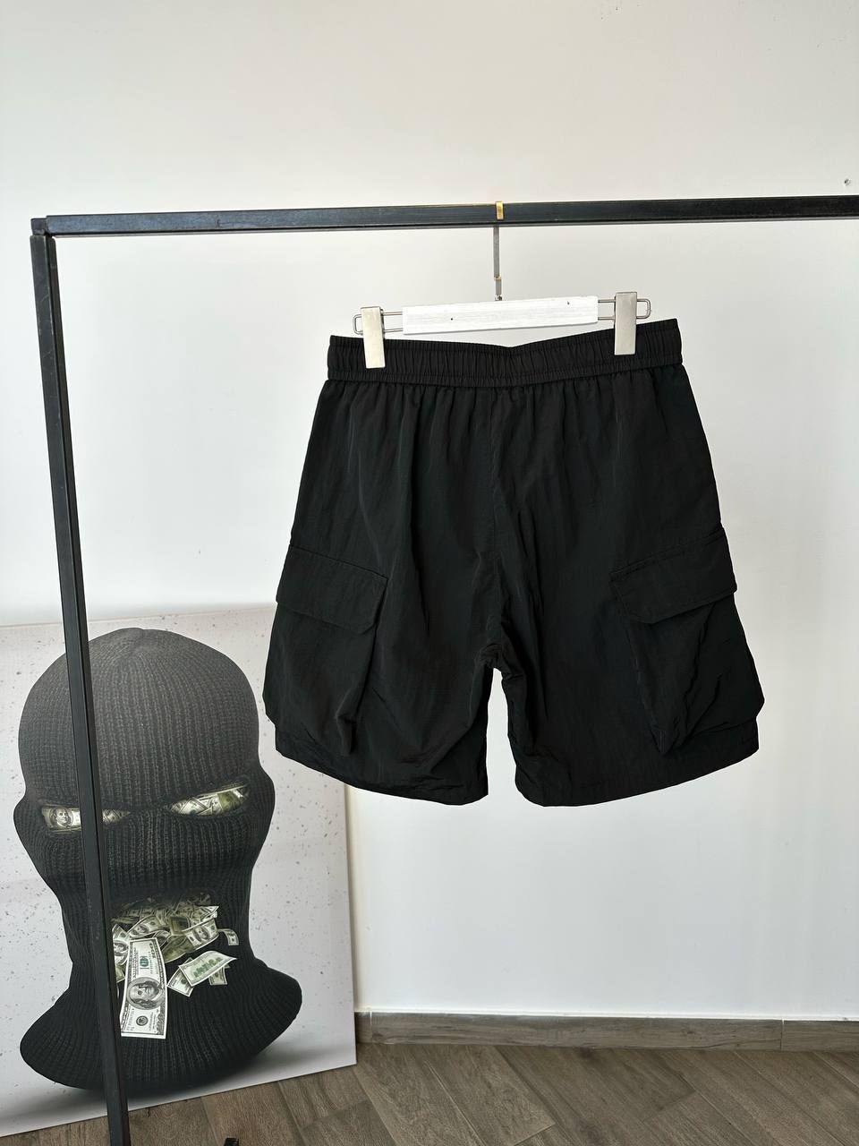 Black raincoat shorts with pockets, M