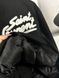 Black bomber jacket with slogan on the back, S