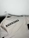 Beige T-shirt with black lettering, L