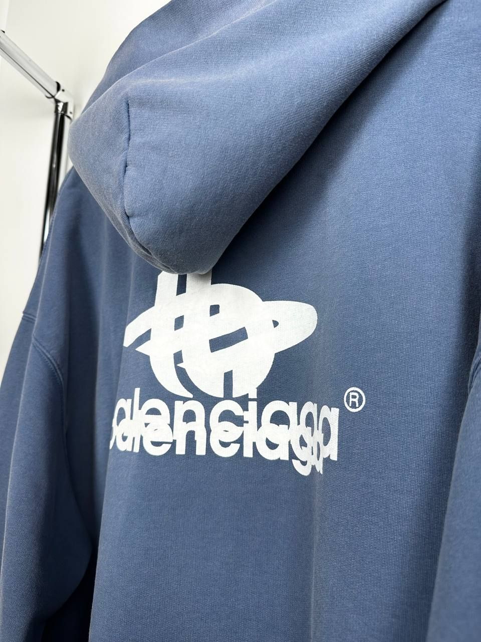 Blue hoodie with white lettering, XS