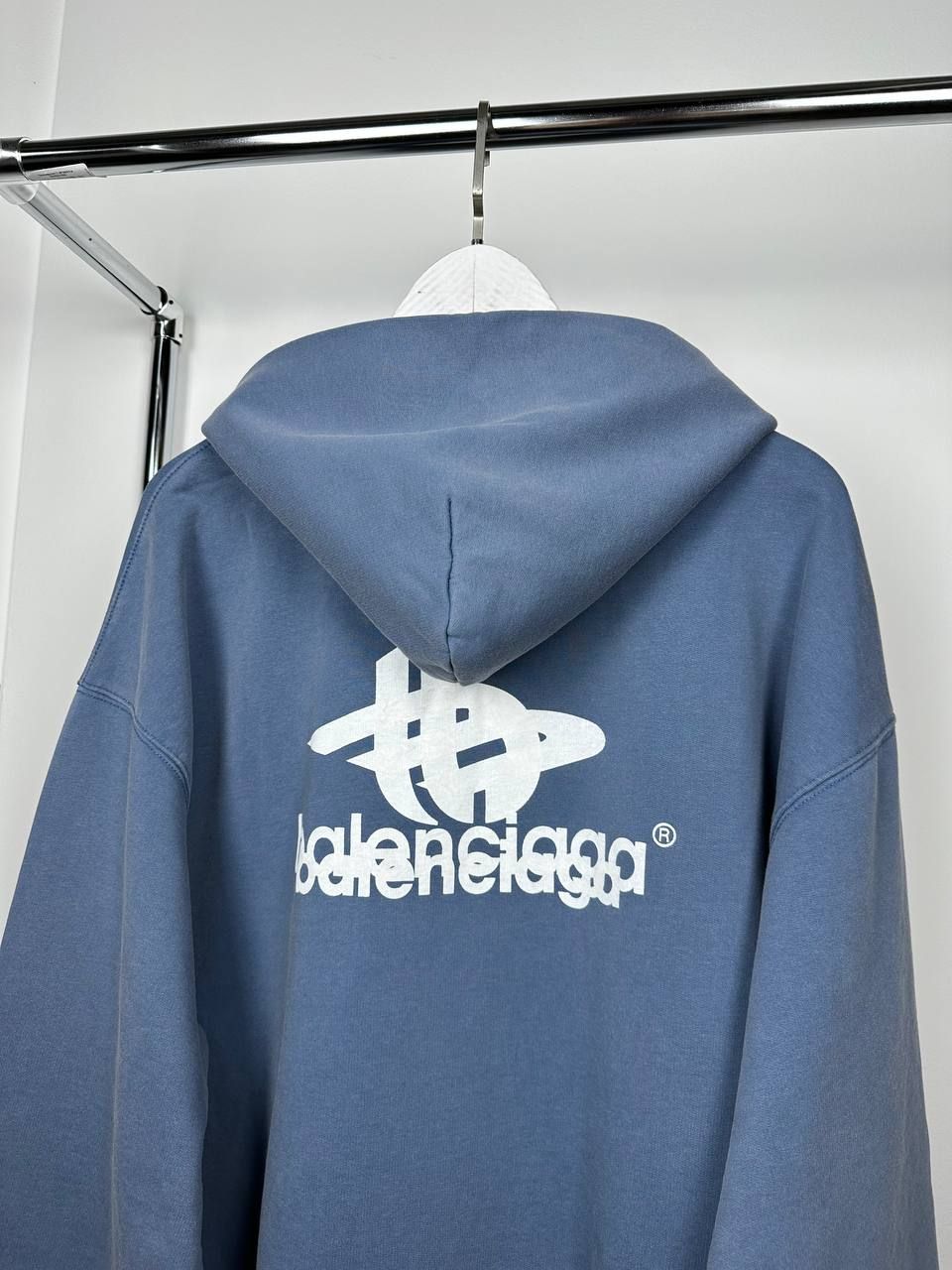 Blue hoodie with white lettering, XS