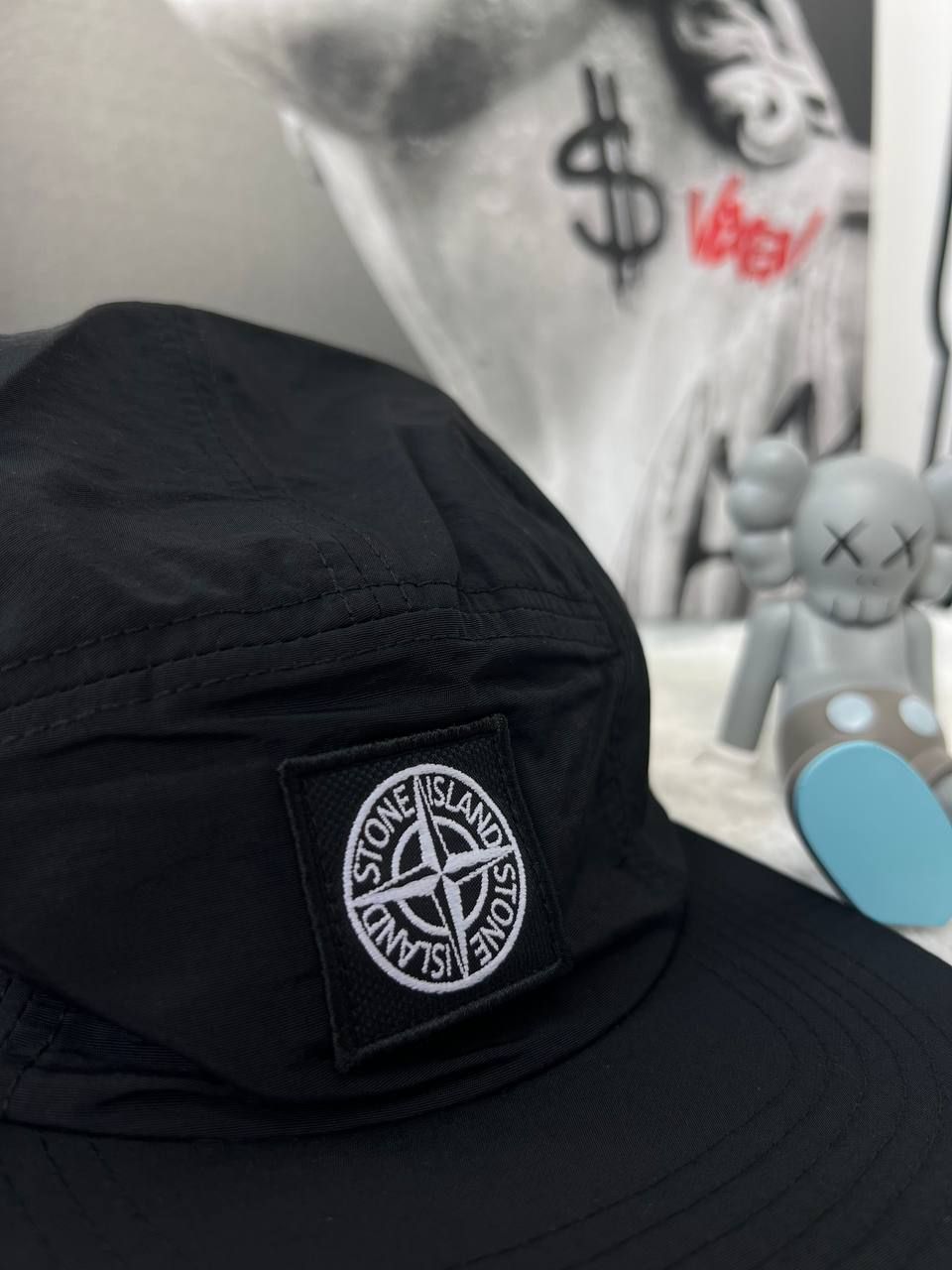 Black cap with round white logo, In stock