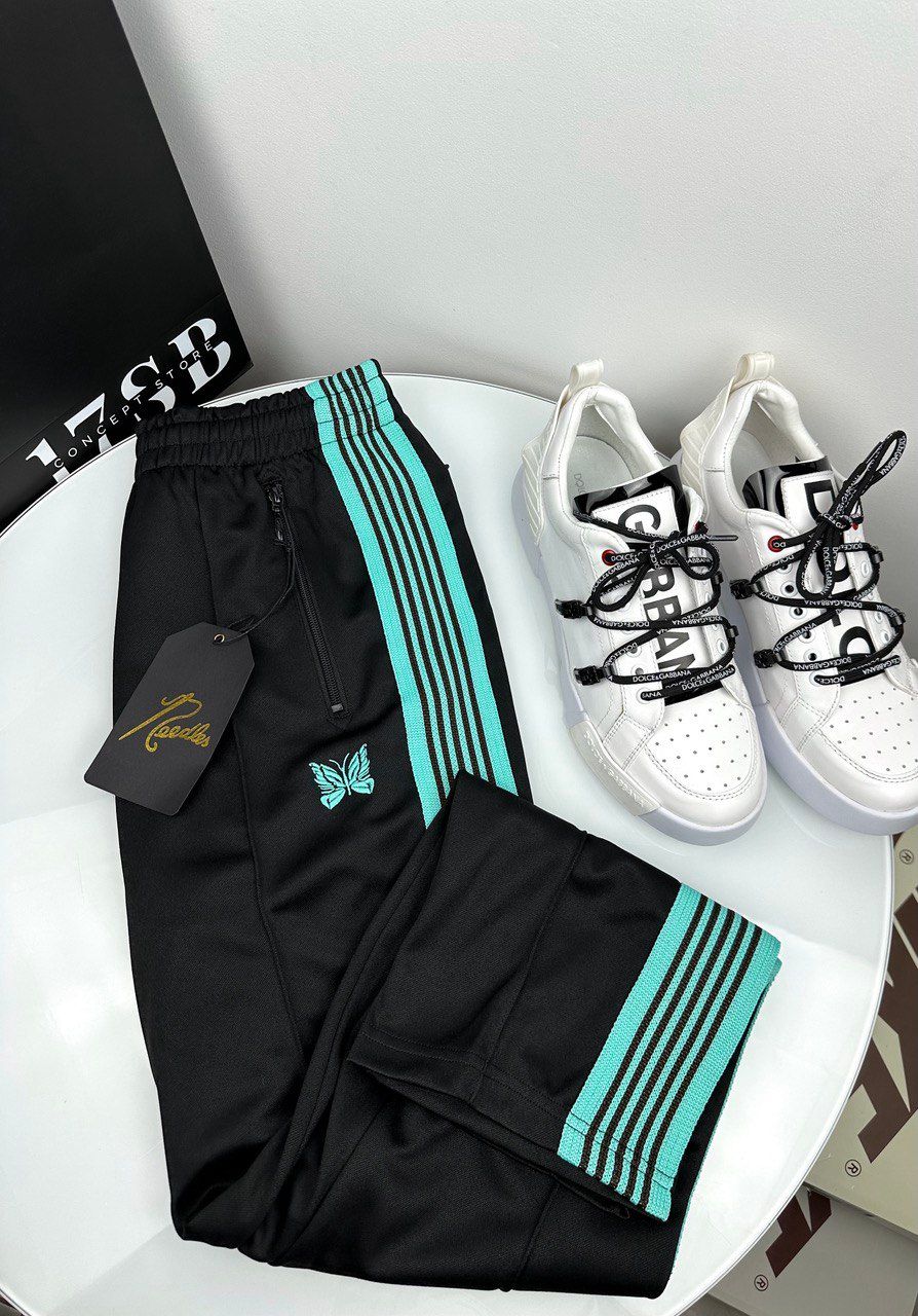 black pants with turquoise stripes, L