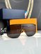 Louis Vuitton sunglasses black with raised logo, 1