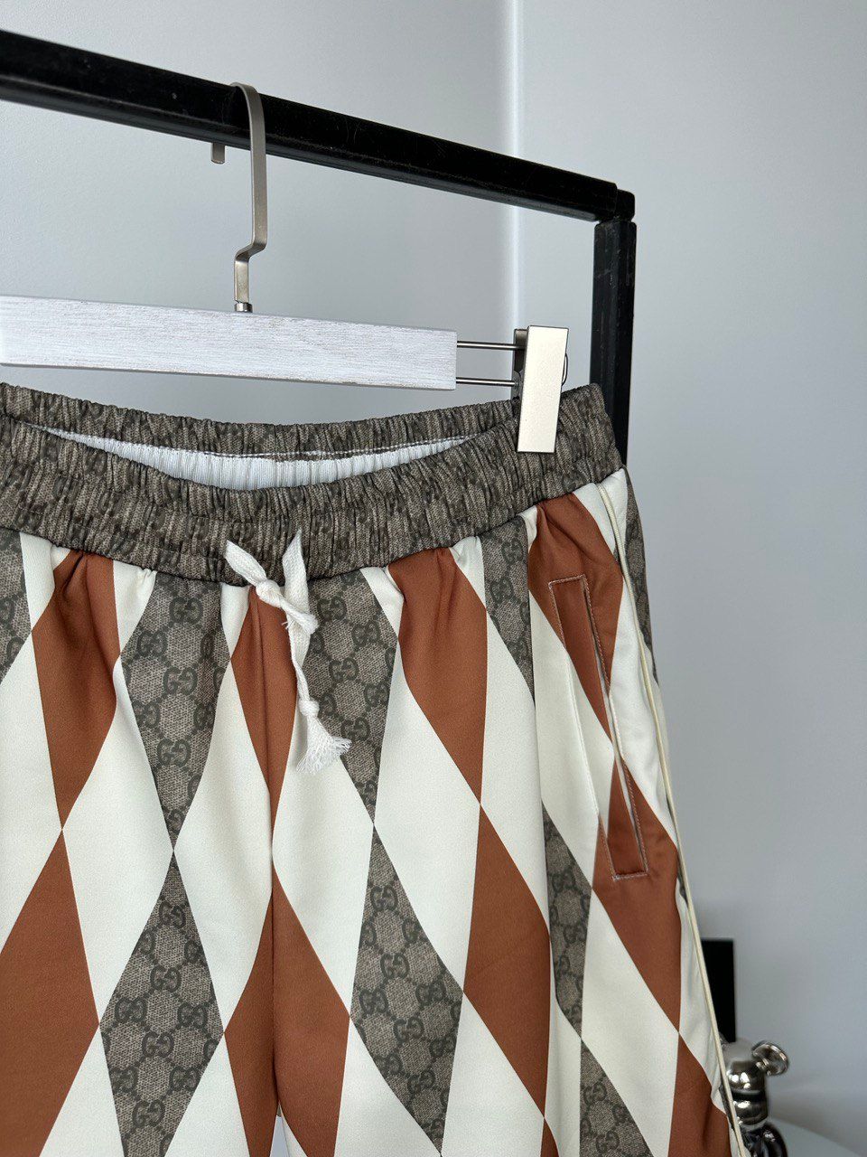 Beige shorts with multicolored rhombuses, L