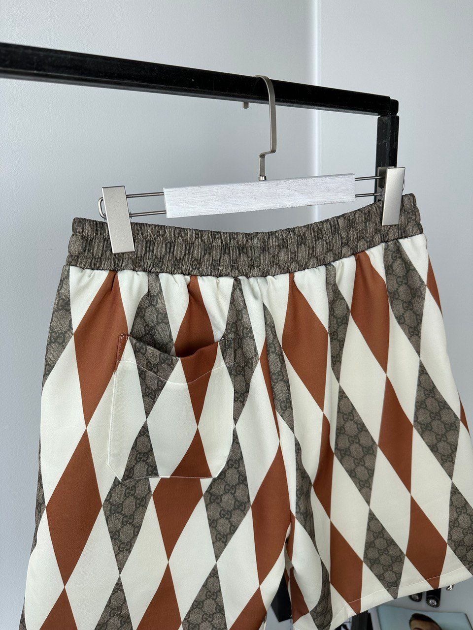 Beige shorts with multicolored rhombuses, L