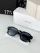 Prada glasses with black frame and blue tint lens, 1