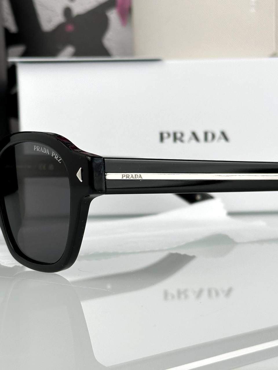 Prada glasses with black frame and blue tint lens, 1