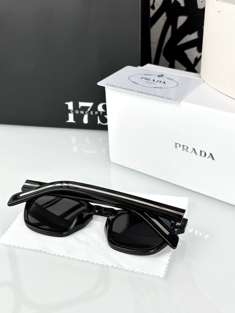 Prada glasses with black frame and blue tint lens, 1