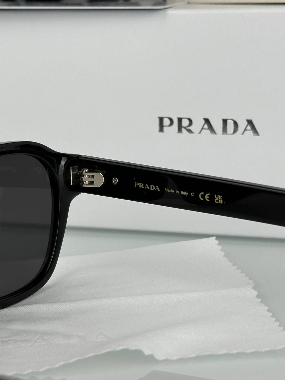 Prada glasses with black frame and blue tint lens, 1