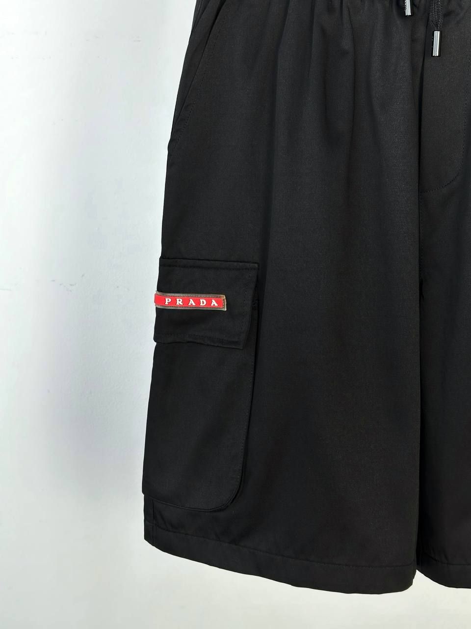 Black shorts with patch pockets, L