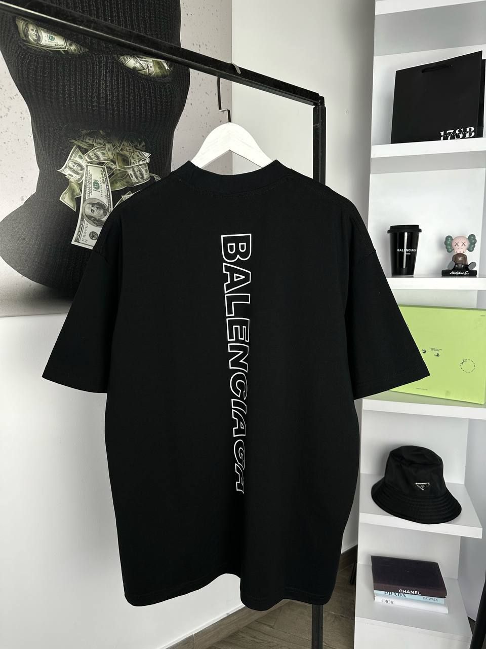 Black T-shirt with vertical inscription on the back, S