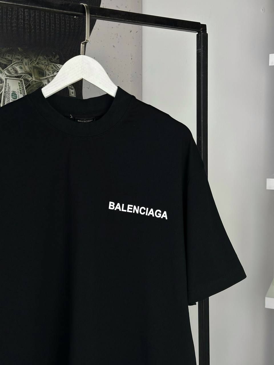 Black T-shirt with vertical inscription on the back, S