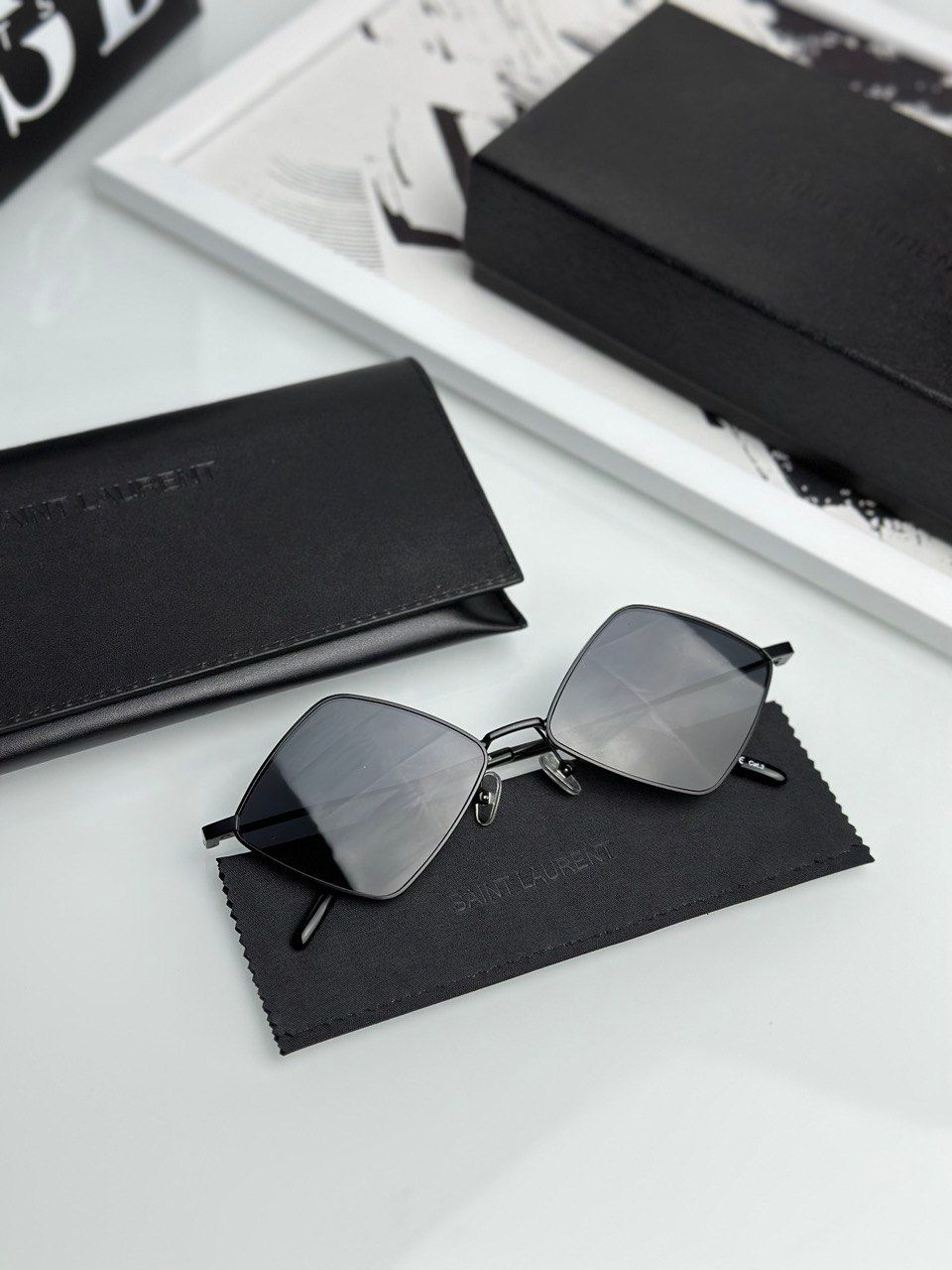 Black glasses with diamond-shaped lenses, 1