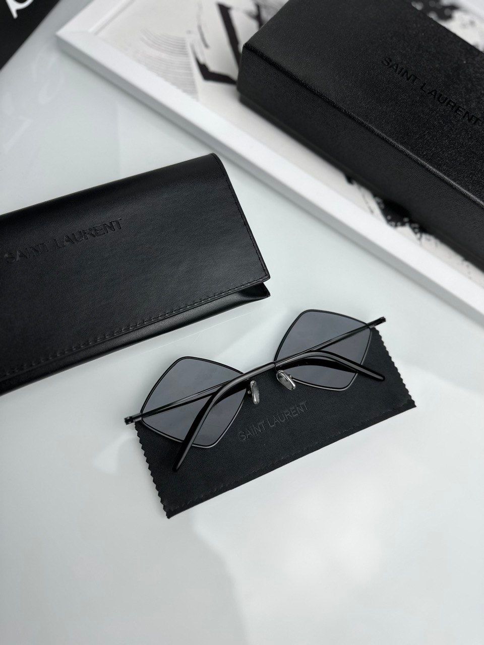 Black glasses with diamond-shaped lenses, 1